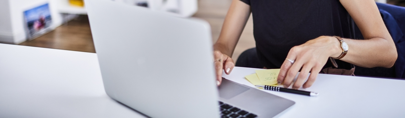 woman working phone laptop